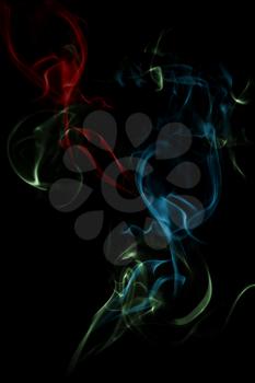 Abstract colorful waving smoke background on black 