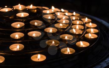 Candles in a dark catholic church