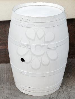 White wooden barrel as a street decoration