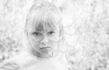 Monochrome portrait of a little blond beautiful Russian girl