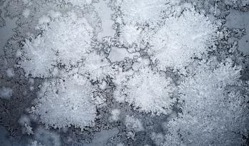 Abstract background with Ice crystals on the window glass