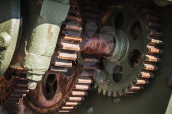 Old rusted gears, close-up photo with selective focus