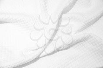 White fabric texture, background photo of cotton blanket