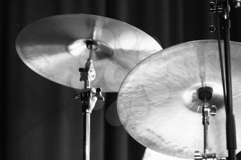 Cymbals. Black and white photo with soft selective focus