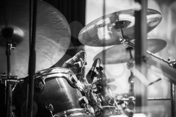 Drum set, black and white rock music background
