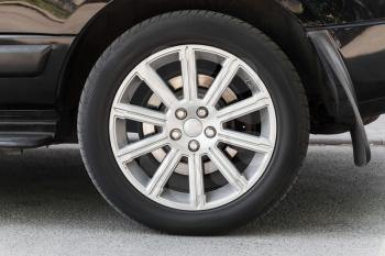 Modern automotive wheel on light alloy disc