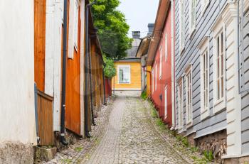 Street view perspective with colorful wooden houses in old town of Porvoo, Finland