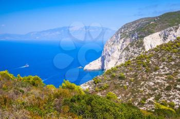 Navagio bay, Greece, coastal landscape. White rocks under blue sky, natural landmark of Greek island Zakynthos