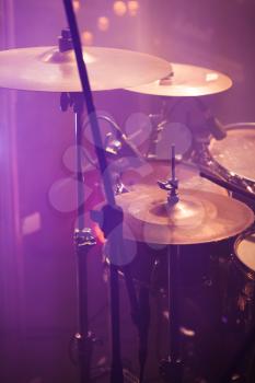 Vertical live music photo background, rock drum set  with cymbals. Closeup photo, soft selective focus