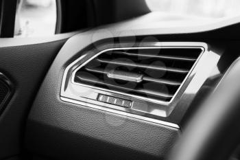 Air ventilation grille with power regulator, modern car interior detail