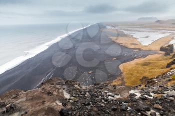 Icelandic coastal landscape. Atlantic Ocean rocky coast. Vik, Iceland