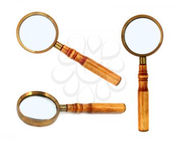 Old style magnifying glass isolated on white