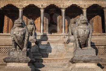 KATMANDU, NEPAL - APRIL 16: Stone statues near the temple on Durbar square on April 16, 2012, Katmandu, Nepal.