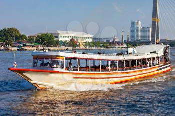 Local transport boat on Chao Phraya River in Bangkok, Thailand