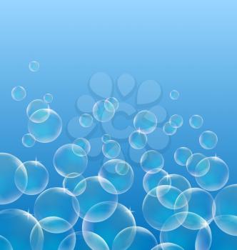 Transparent air bubbles in water on blue background