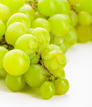 Bunches of green grapes. Isolated over white background.