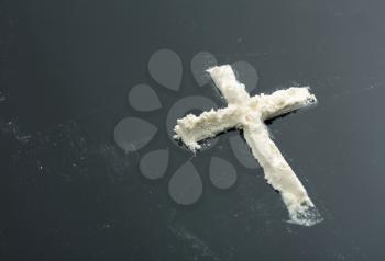Cocaine cross on grey background