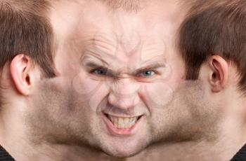 A panoramic face of very malicious man