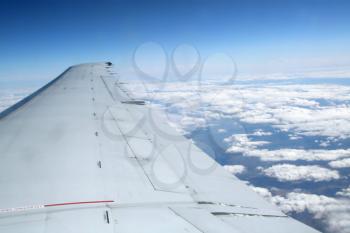 View of long airplane wing from window