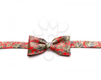 Red bow-tie with flowers isolated on white background