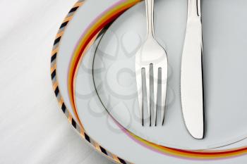 Fork and knife on the plate
