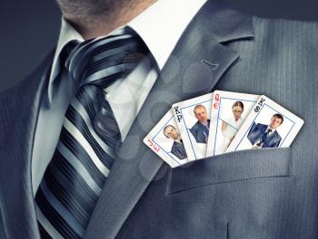 Business team cards in suit pocket