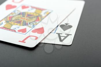 Black Jack closeup. Two cards on grey background