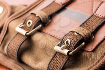 Closeup of brown backpack buckles