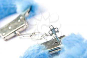 Blue fluffy handcuffs with key