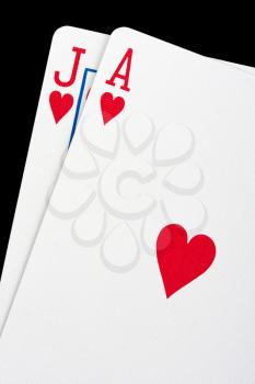 Close-up of blackjack cards isolated on black