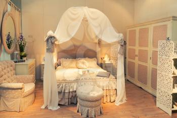 Nice luxury bed in a bedroom