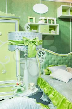Nice luxury light green bedroom with lamp