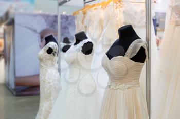 Wedding dresses on mannequin in the shop