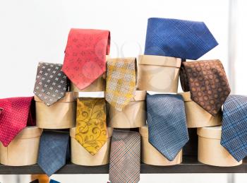 Multicolored vintage neckties with little boxes