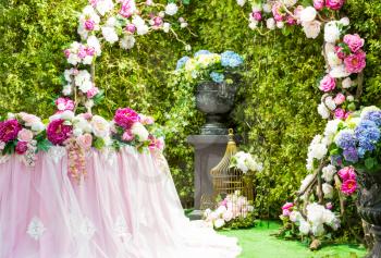 Beautiful wedding arch with flowers