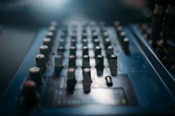 Volume control panel, sound board closeup. Professional audio engineering