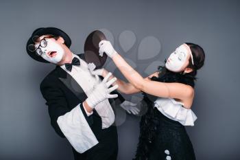Pantomime theater performers with frying pan. Mime actors comedy performing