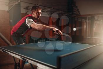 Table tennis, man playing game, ball with trace. Ping pong training indoor