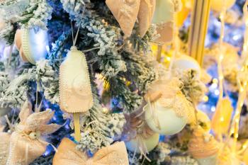 Xmas tree branch with blue decoration closeup, new year decorative design. Winter holiday celebration