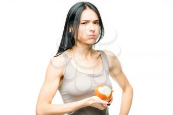 Cold, snot and flu protection, woman eats onion, white background. Female person in lingerie, disease prevention