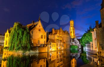 Belgium, Brugge, ancient European town with river channels, night cityscape, panoramic view. Tourism and travel, famous europe landmark, popular places