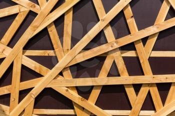 Abstract wooden stick pattern isolated on brown background. Wood splinter backdrop or wallpaper