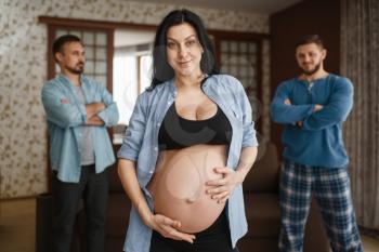 Pregnant woman with belly, two men on background, who is the father, humor. Pregnancy, prenatal period at home. Expectant mom, joke