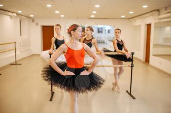 Master and young ballerinas, performance in class. Ballet school, female dancers on choreography lesson, girls practicing grace dance