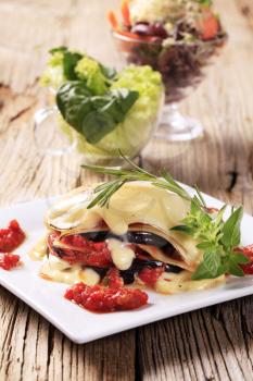 Aubergine and tomato lasagna topped with cheese sauce