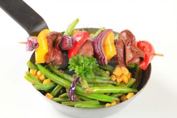 Liver skewer with green beans and sweetcorn