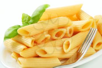 Portion of cooked penne pasta