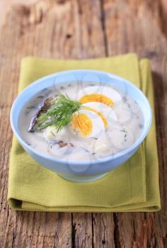 Sour cream dill soup with mushrooms and boiled egg