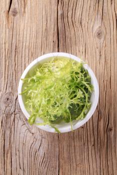 Bowl of fresh salad greens - closeup