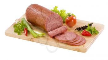 Salami sliced on a cutting board